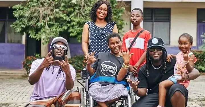 DopeNation surprises physically challenged student at Serwaa Nyarko SHS with electronic wheelchair
