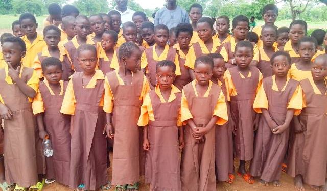 School children in Yendi beaming in new uniforms but still dreaming of classrooms