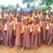 School children in Yendi beaming in new uniforms but still dreaming of classrooms