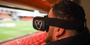 ‘A wee bit emotional’: Headset helps visually-impaired football fan see his team play for first time