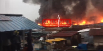 Fire destroys structures at Odawna as floods hamper emergency response