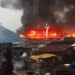 Fire destroys structures at Odawna as floods hamper emergency response