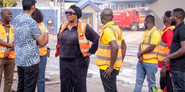 GFZA CEO visits Melcom Warehouse after fire incident at Tema EPZ