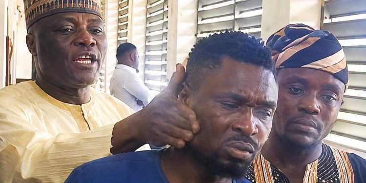 Police launch manhunt for man captured assaulting suspect in viral video