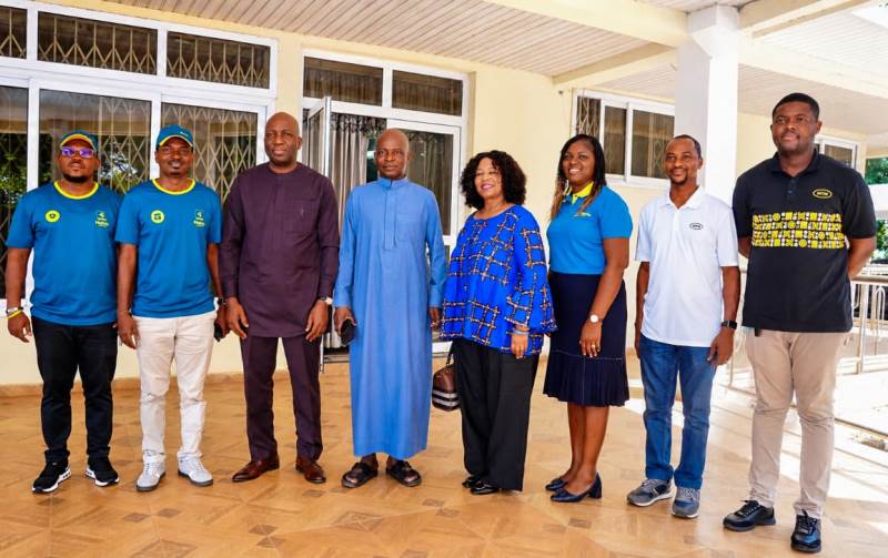 Ali Adolf John Northern Regional Minister pose for a picture with CEO of MMFL and management